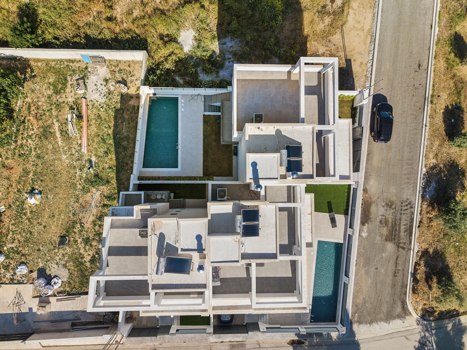 Aerial view of the Vari property within its block