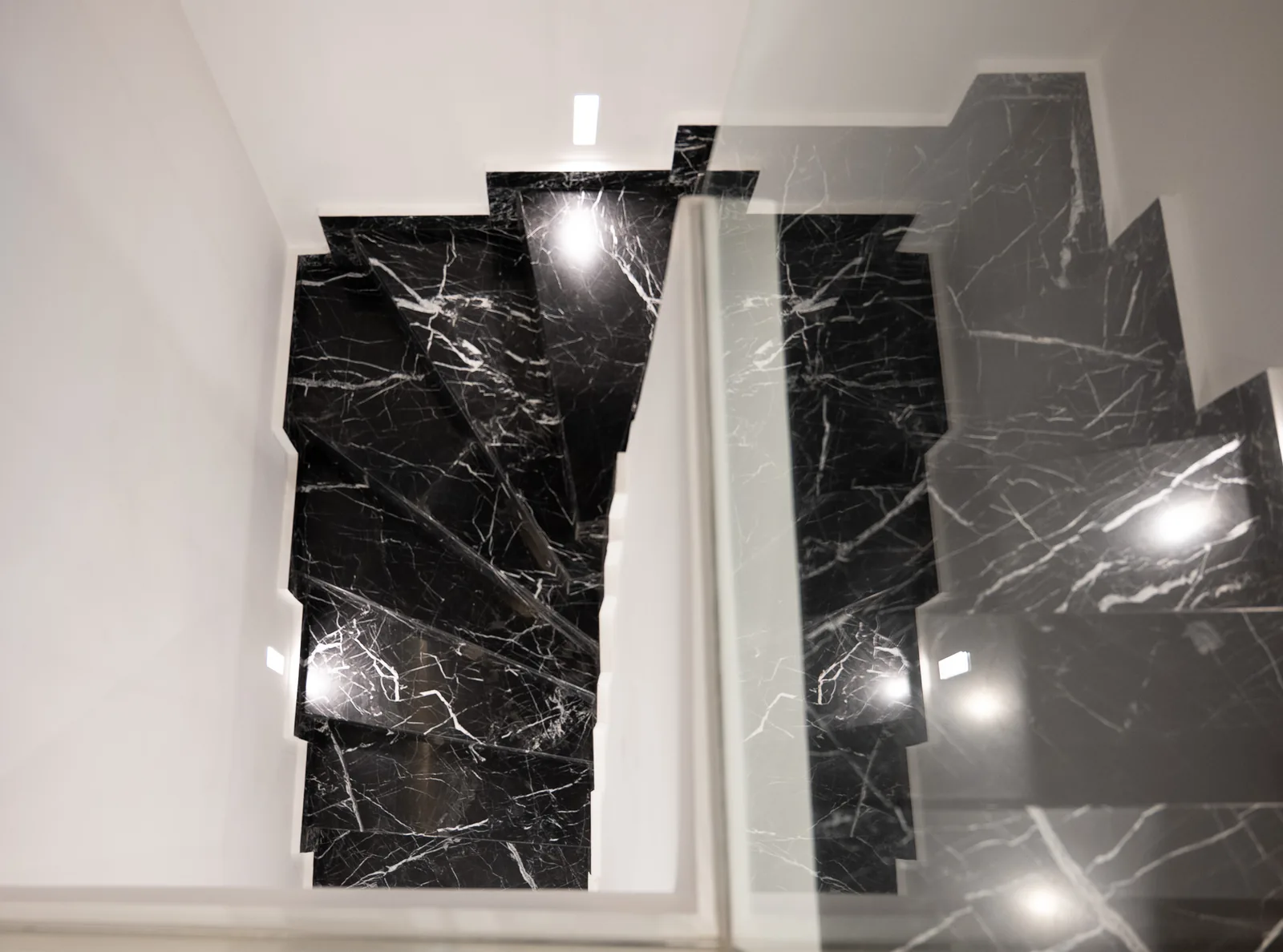 Kitsos Constructions residence, the black marble staircase