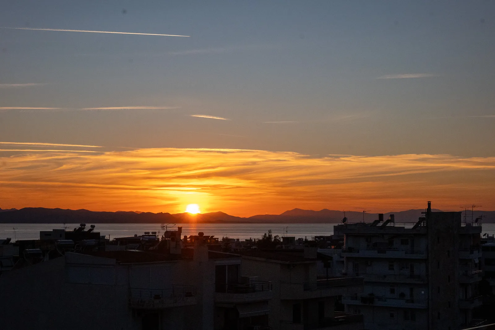Kitsos Constructions residence, sunset over the Athenian suburbs from the terrace
