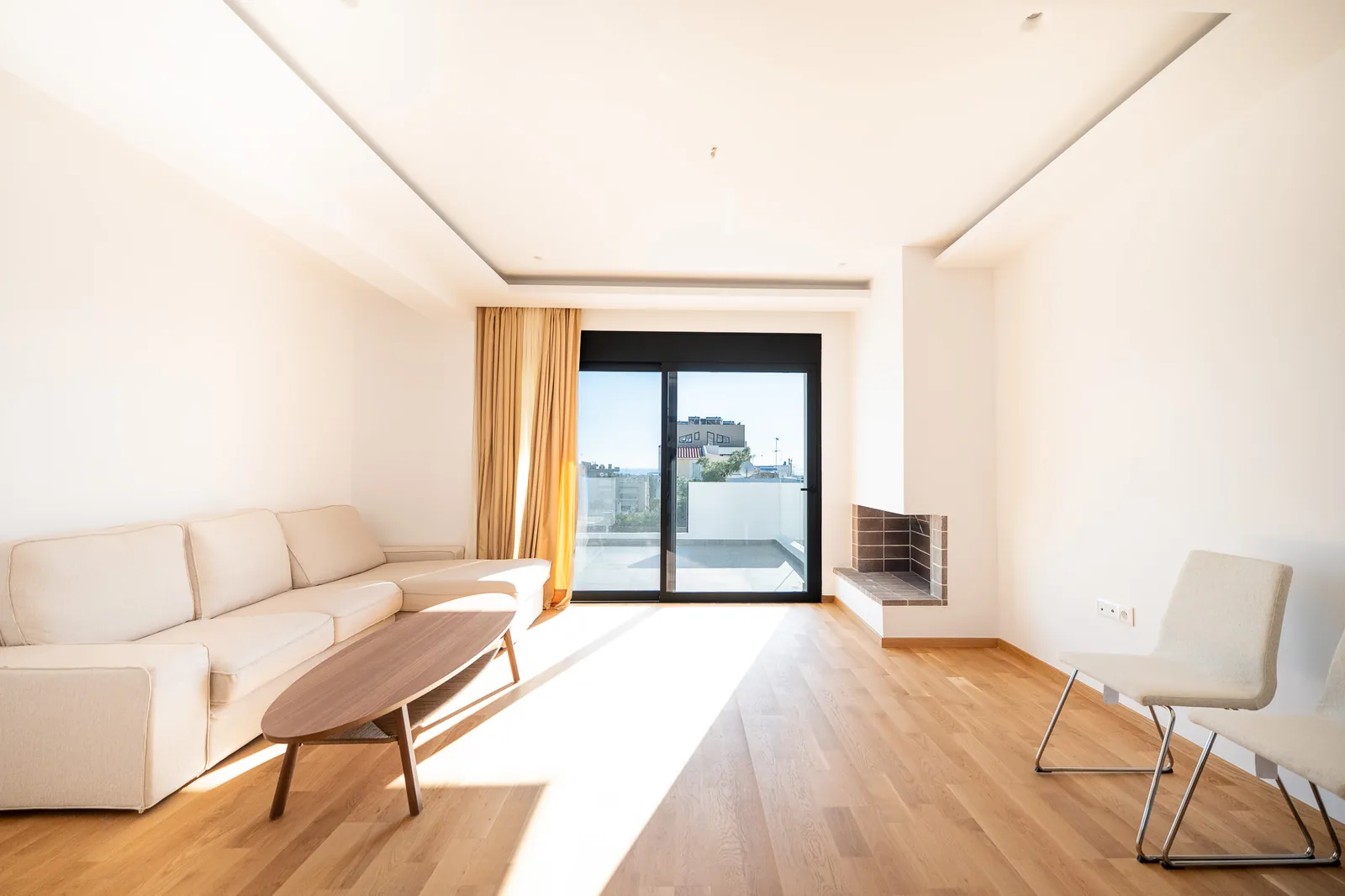 Kitsos Constructions residence, living room opening to the terrace