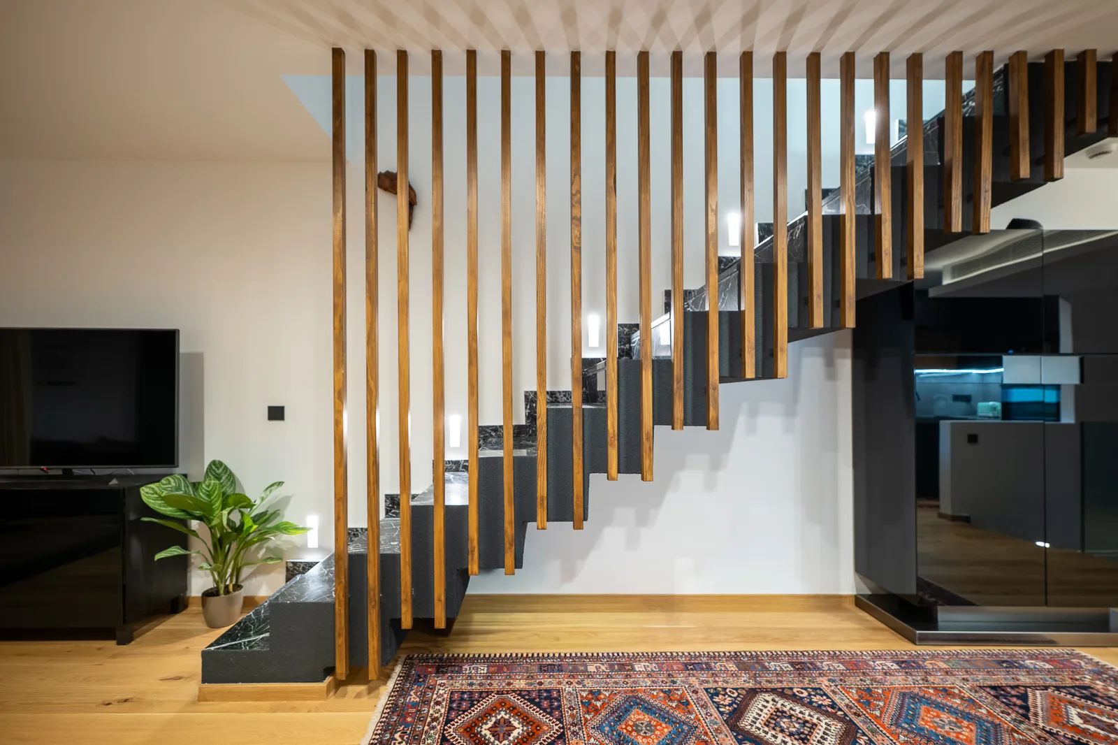 Kitsos Constructions residence, living area beside the staircase