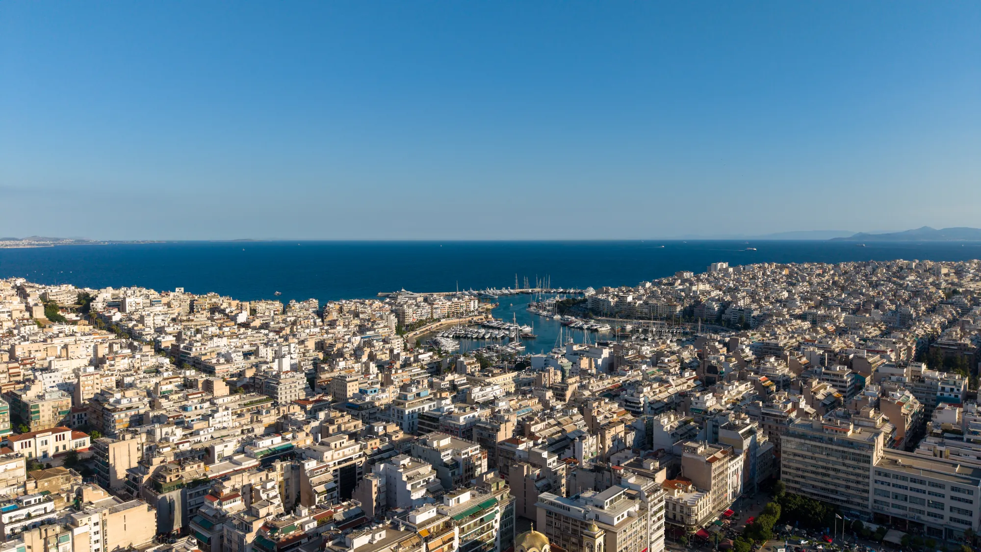 ORMOS Piraeus, piraeus from the air, the harbour and the open sea beyond