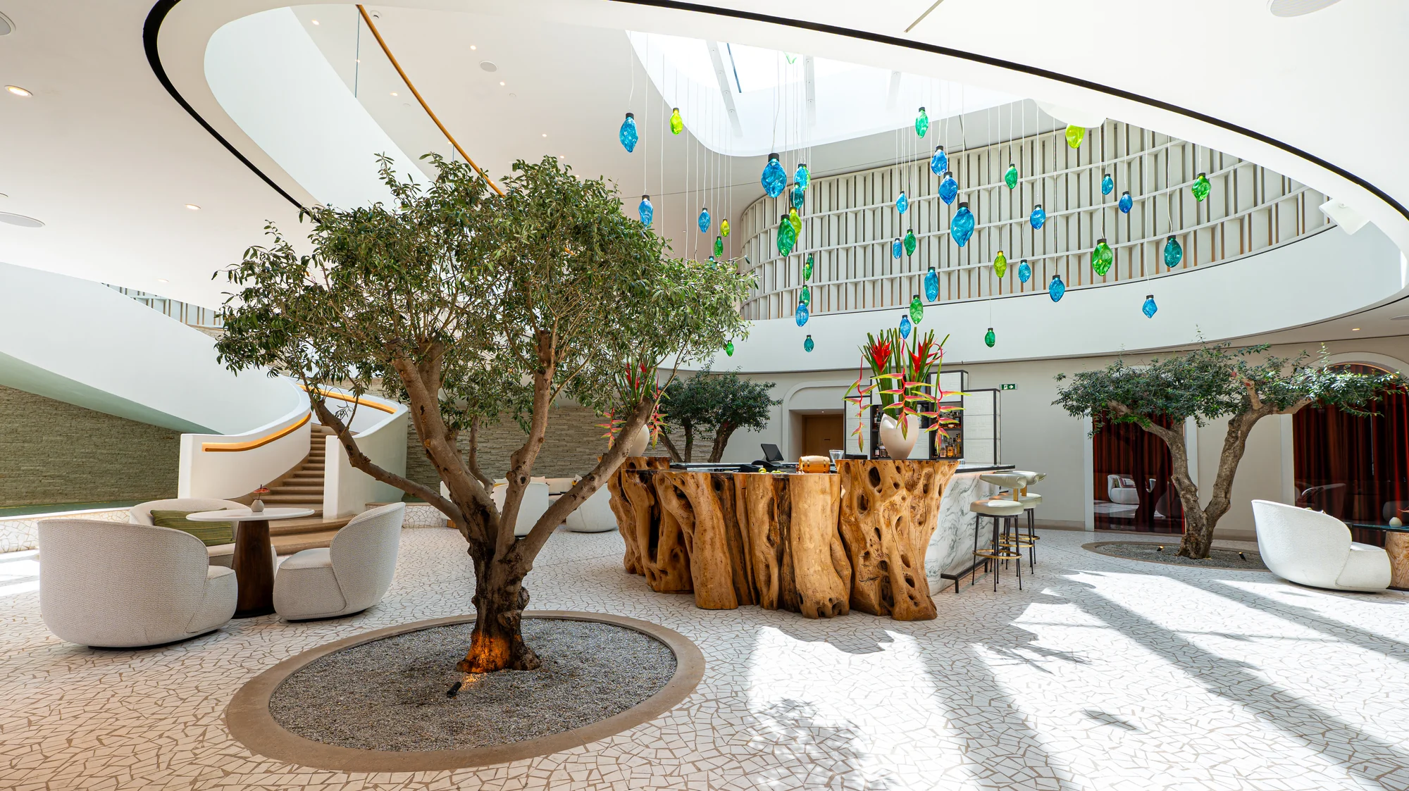 One&Only Aesthesis, the sculptural lobby with an olive tree