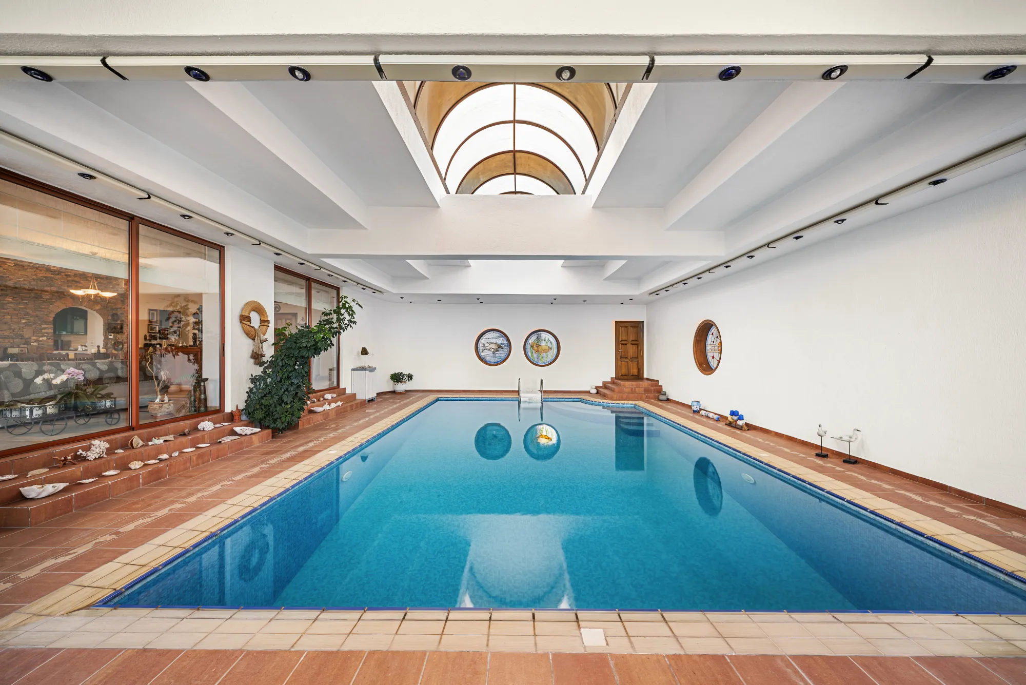 Verde Vista, the heated indoor pool with its vaulted ceiling and garden view