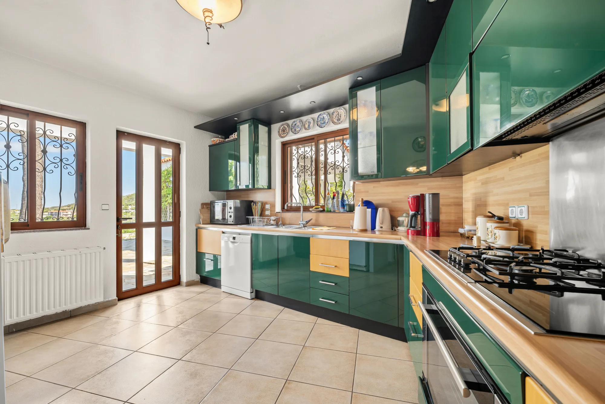 Verde Vista, kitchen with green cabinetry