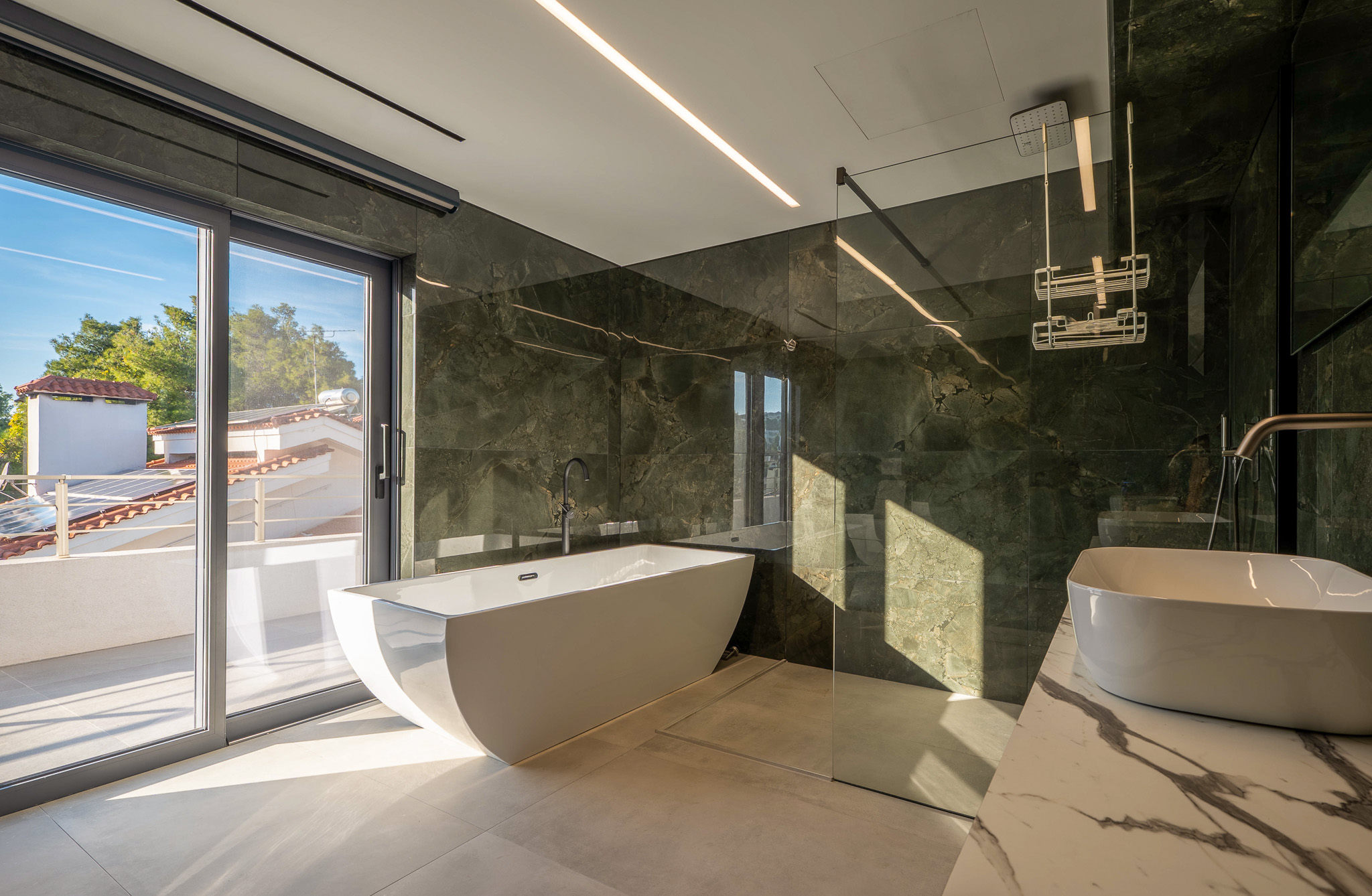 Villa Bond, master bath with green marble and balcony view