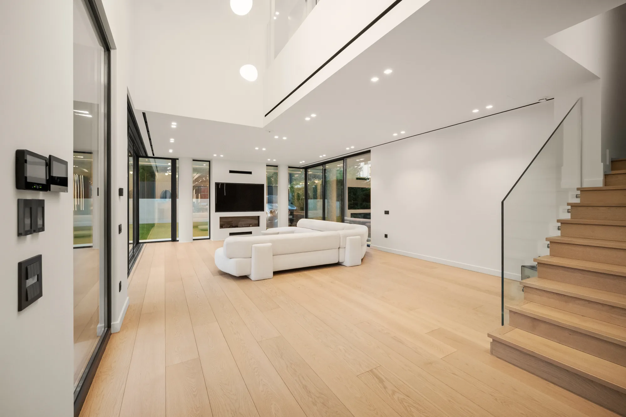 Villa Eden, living room and staircase in daylight