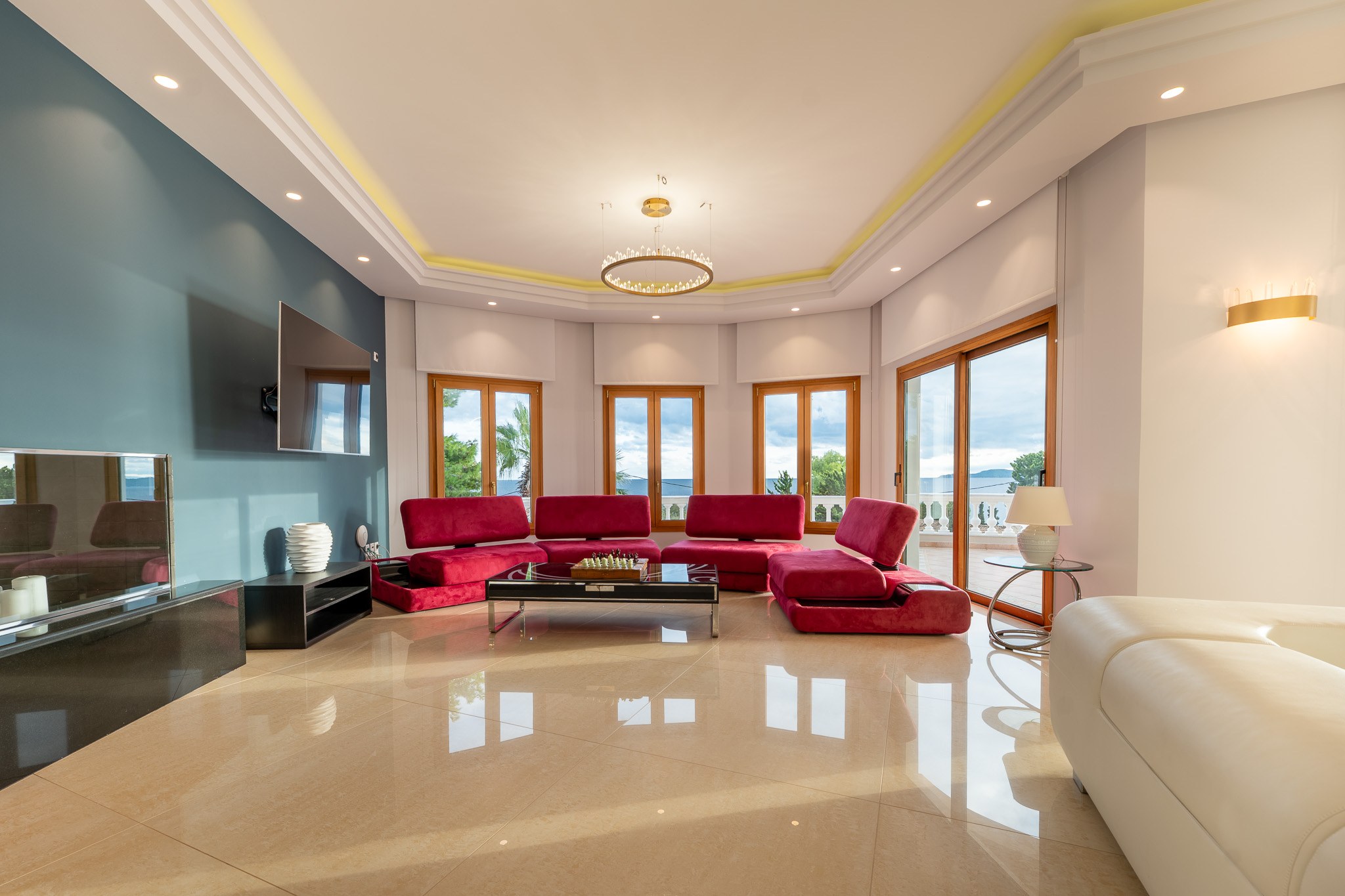 Villa Rafaella, red sofa room