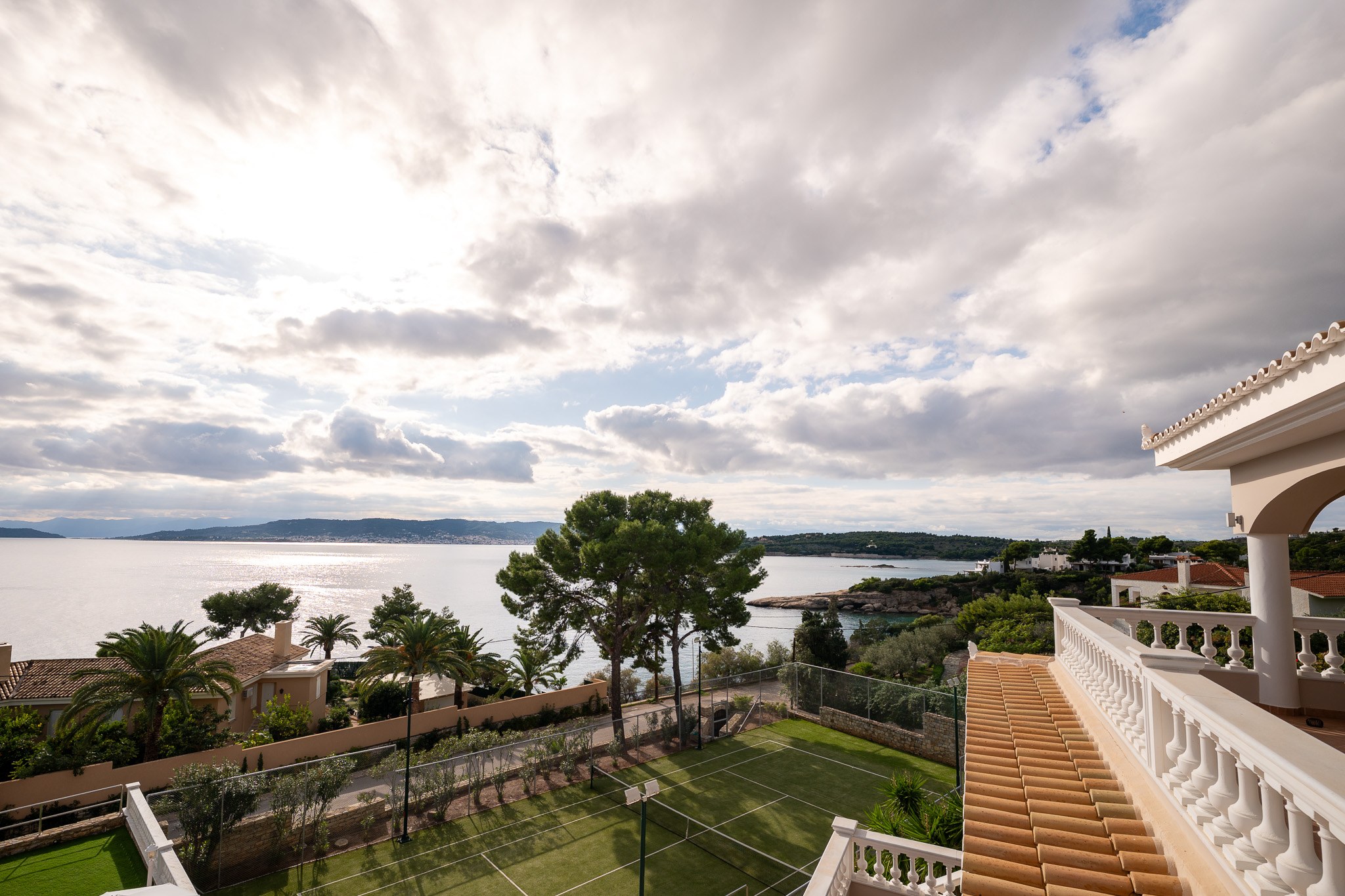 Villa Rafaella, balcony view to bay and tennis court