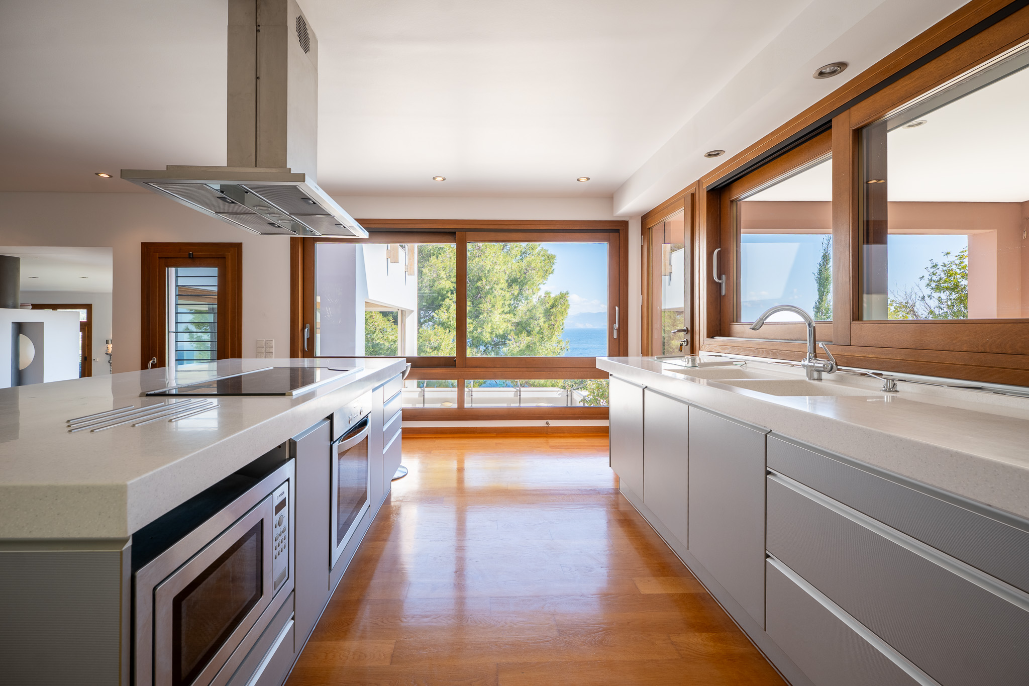 Villa Selene, galley kitchen with island and sea-view window