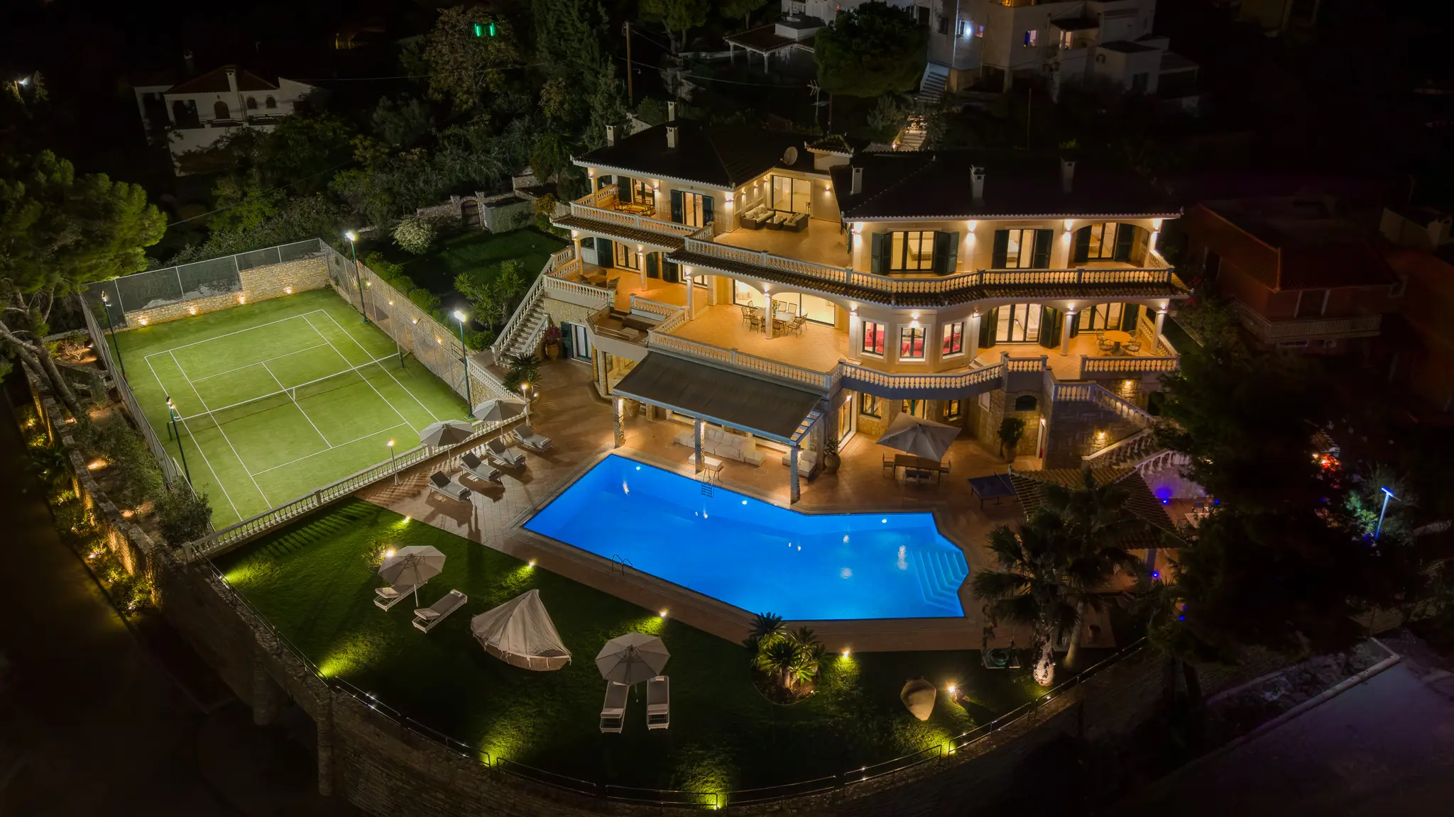 Property exterior before House of Advanced renovation, nighttime view